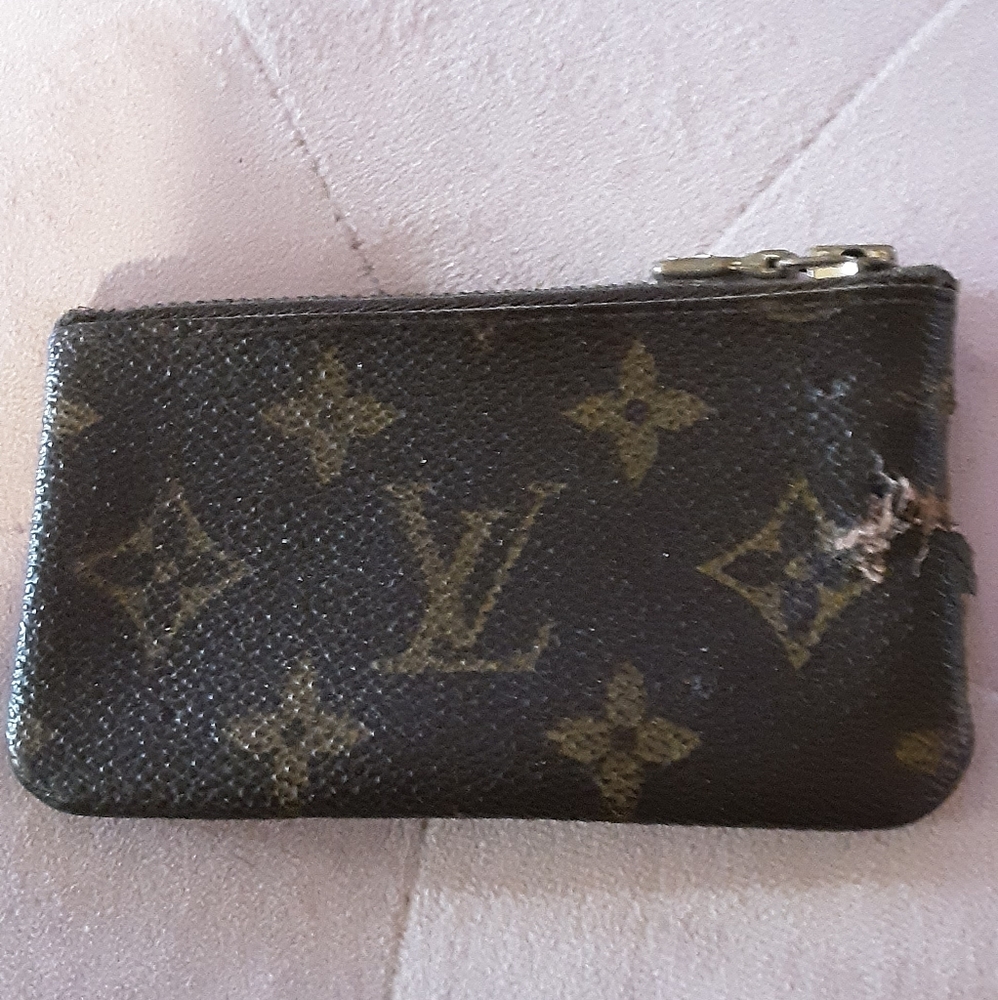 Very small Louis Vuitton case.